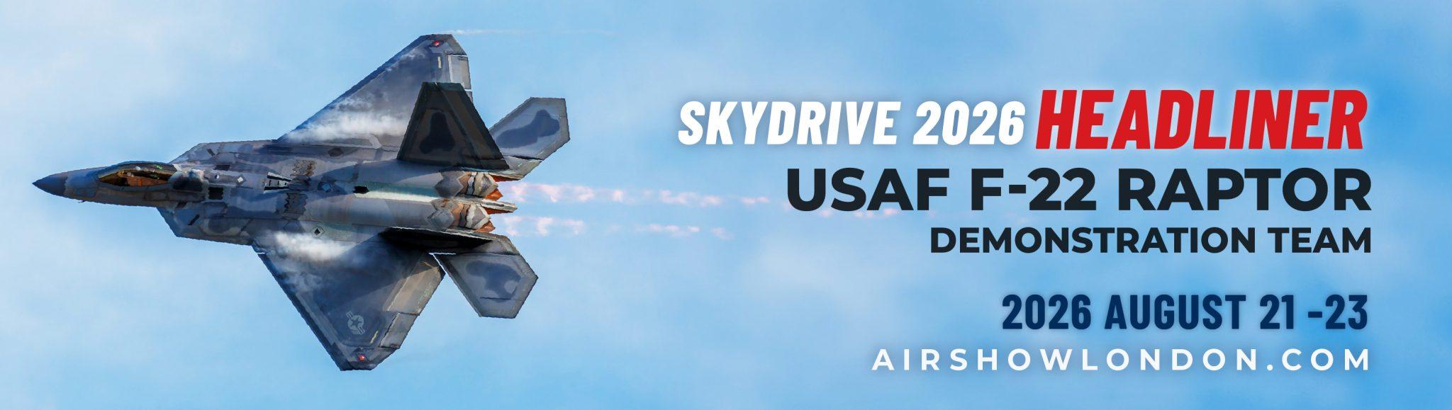 USAF F-22 Raptor flying with text: “SkyDrive 2026 Headliner – USAF F-22 Raptor Demonstration Team, August 21–23, 2026 – AirshowLondon.com”
